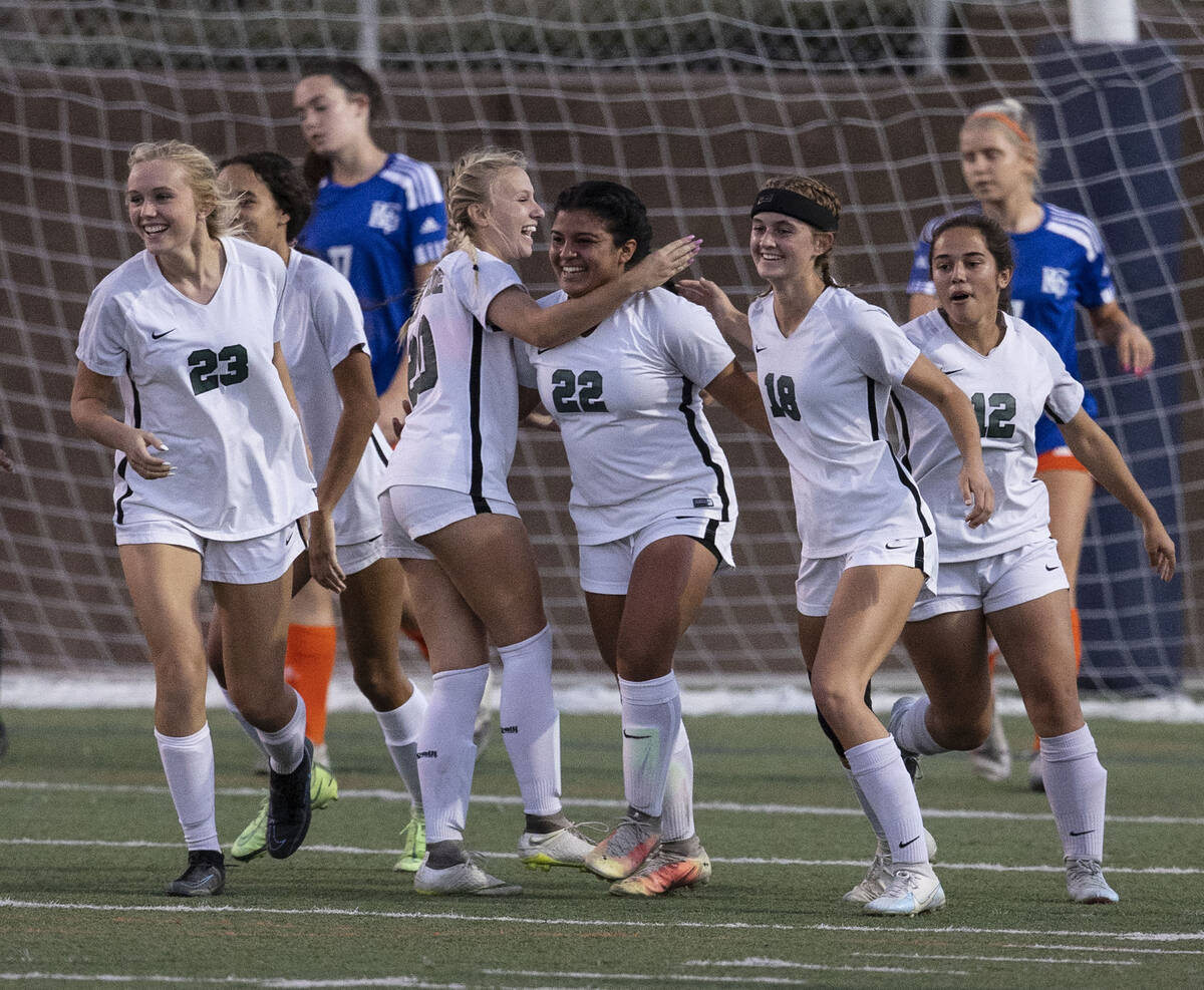 Palo Verde’s Stephanie Reyes (22) celebrates her first goal with her teammates during th ...