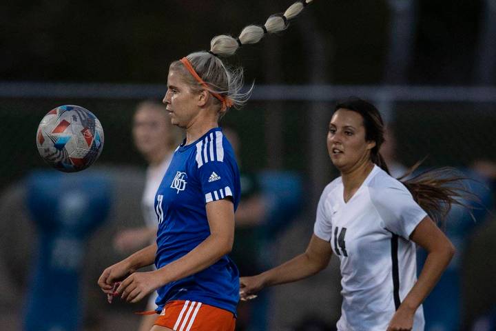 Bishop Gorman's Michelie Madrid (11) controls the ball as Palo Verde's Lauren Kinkead (14) duri ...