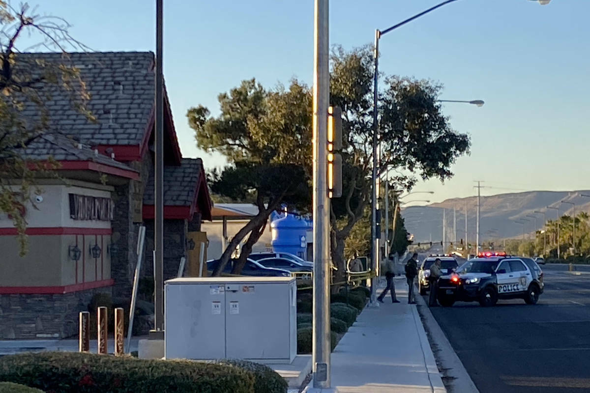 Las Vegas police investigate an armed robbery at a bar in the western valley in December 2020. ...