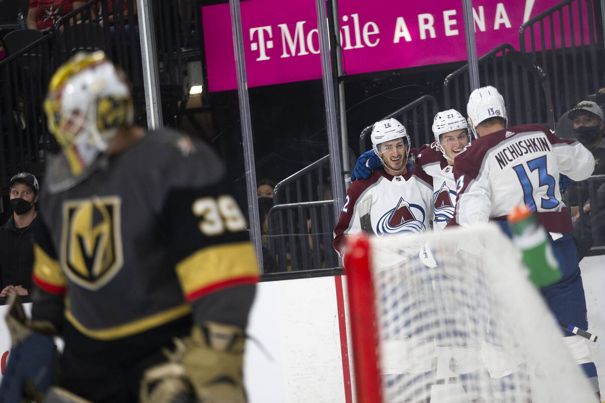 Avalanche center Jayson Megna (12), right wing Oskar Olausson (27) and right wing Valeri Nichus ...