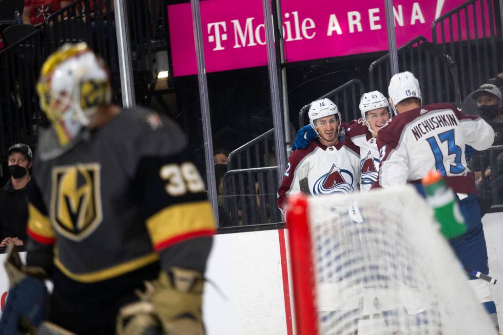 Avalanche center Jayson Megna (12), right wing Oskar Olausson (27) and right wing Valeri Nichus ...