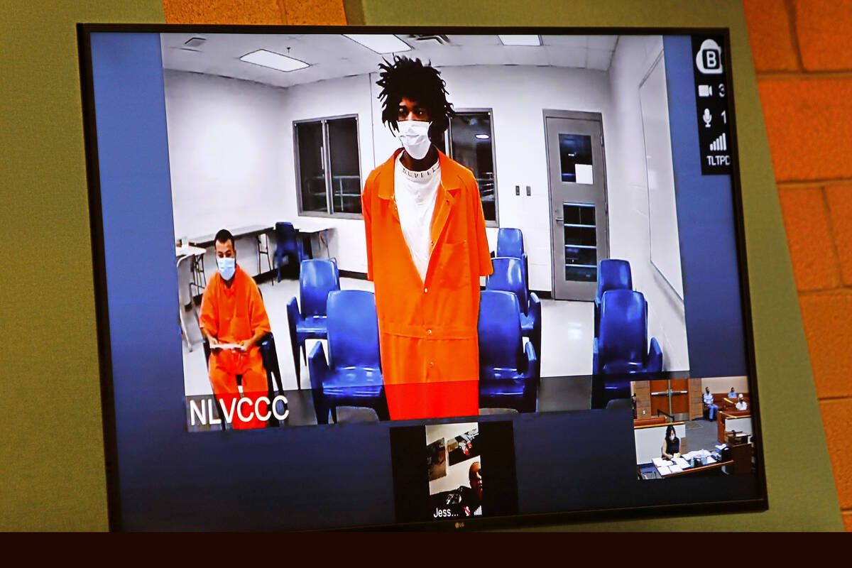 Andre Robinson appears via video conference during a court hearing at North Las Vegas Justice C ...