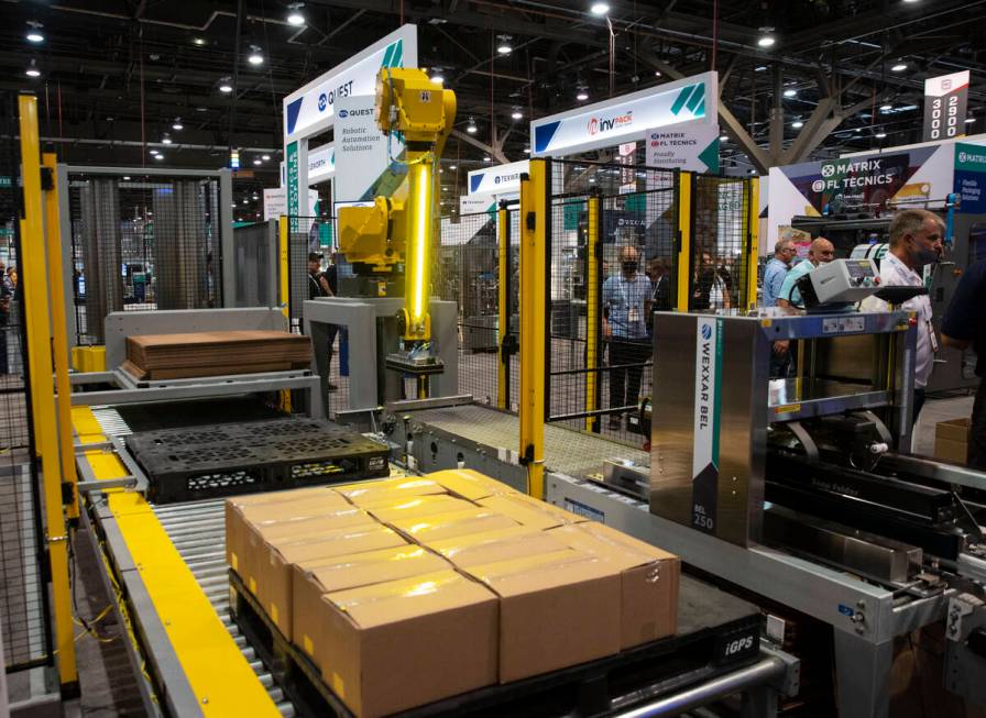 A BOX BOT QB300, a robotic palletizer, is displayed during the PACK EXPO at the Las Vegas Con ...