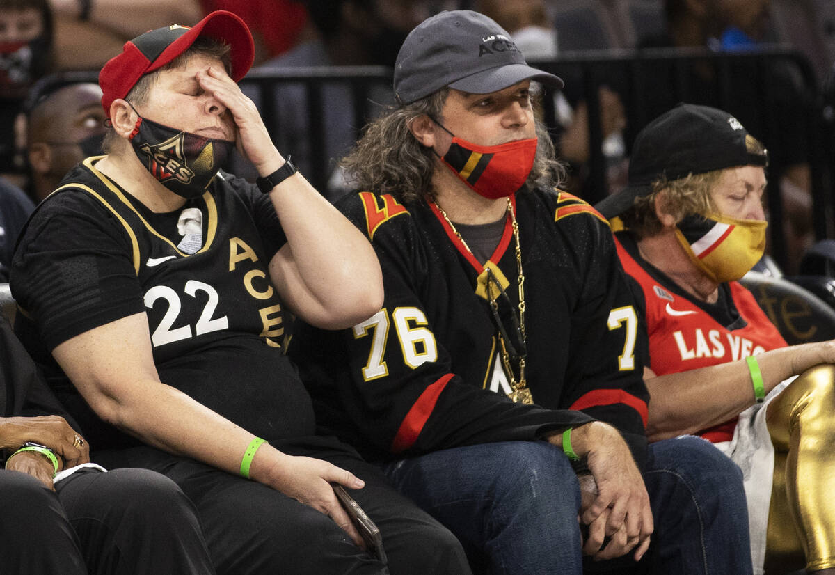 Las Vegas fans react to a bad play by the Aces in the first half of the WNBA semifinals against ...