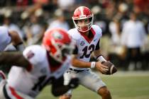 Georgia quarterback Stetson Bennett (13) plays against Vanderbilt during an NCAA college footba ...