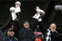 In this Feb. 7, 2017, file photo, New England Patriots quarterback Tom Brady holds up Super Bow ...