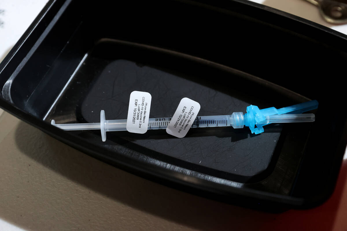 A Pfizer COVID-19 vaccine booster shot is ready for use at the Southern Nevada Health District ...