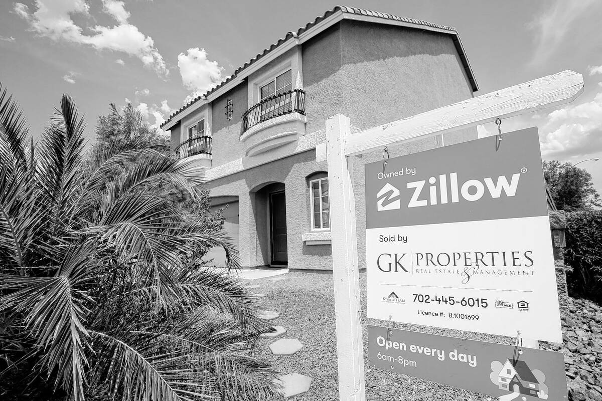 A sale sign is seen in front of a Zillow-owned house at 9992 Mills Reef Court in Las Vegas, Fri ...