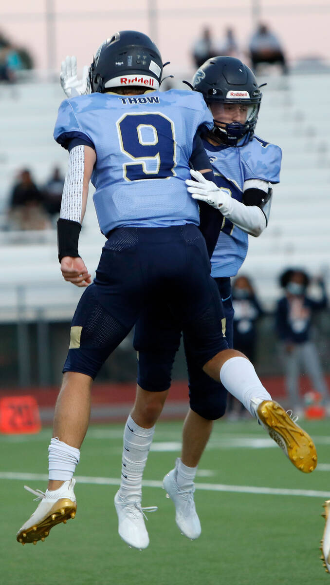 Foothill High School's Cole Reed (10) celebrates his touchdown with his teammate Jack Thow duri ...