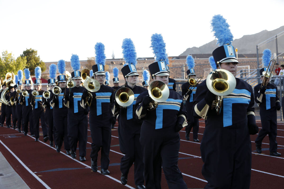 Foothill High School marching band members perform before a football game against Legacy High S ...