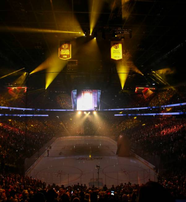 Pacific Division and Western Conference championship banners are raised during a season-opening ...