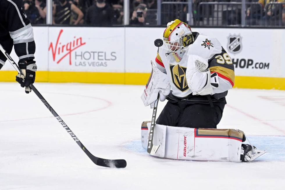 Vegas Golden Knights goaltender Laurent Brossoit stops the puck from the Los Angeles Kings duri ...