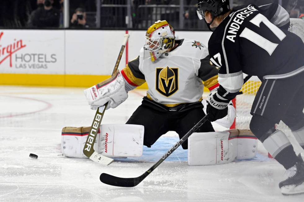 Vegas Golden Knights goaltender Laurent Brossoit defends against Los Angeles Kings' Lias Anders ...