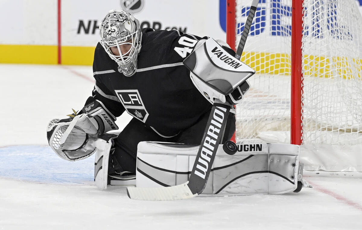 Los Angeles Kings goaltender Calvin Petersen stops a shot by the Vegas Golden Knights during th ...