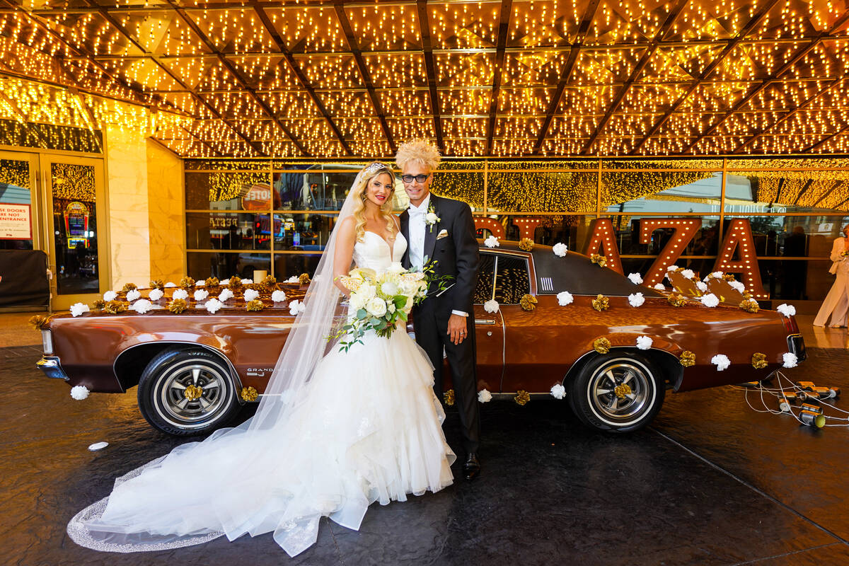 Murray Sawchuck and Dani Elizabeth (and his famous 1967 Grand Prix) on their wedding day at the ...
