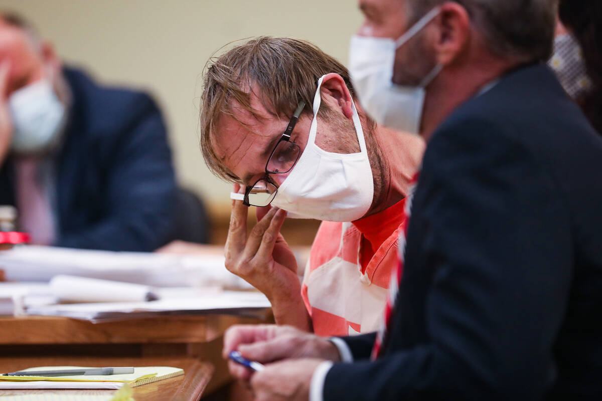 Brad Mehn, center, who with two others is charged in the killing of 27-year-old Roy Jaggers, cr ...