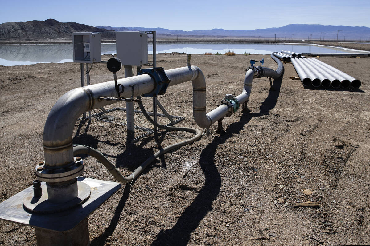 Water is pumped into an evaporation pond at Albemarle's lithium mine in Silver Peak, Nev., on T ...