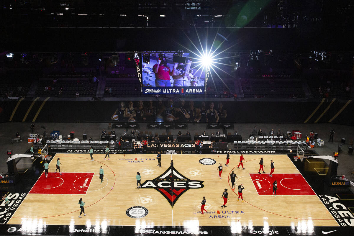 The Las Vegas Aces and New York Liberty warm up before a WNBA game at Michelob Ultra Arena on T ...