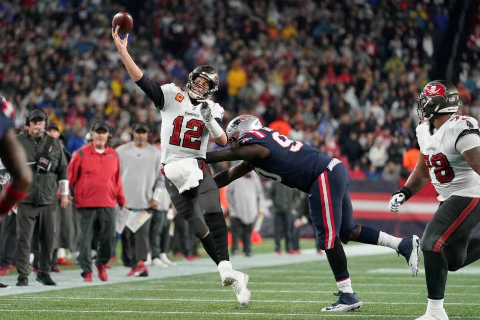 Tampa Bay Buccaneers quarterback Tom Brady (12) throw during the second half of an NFL football ...