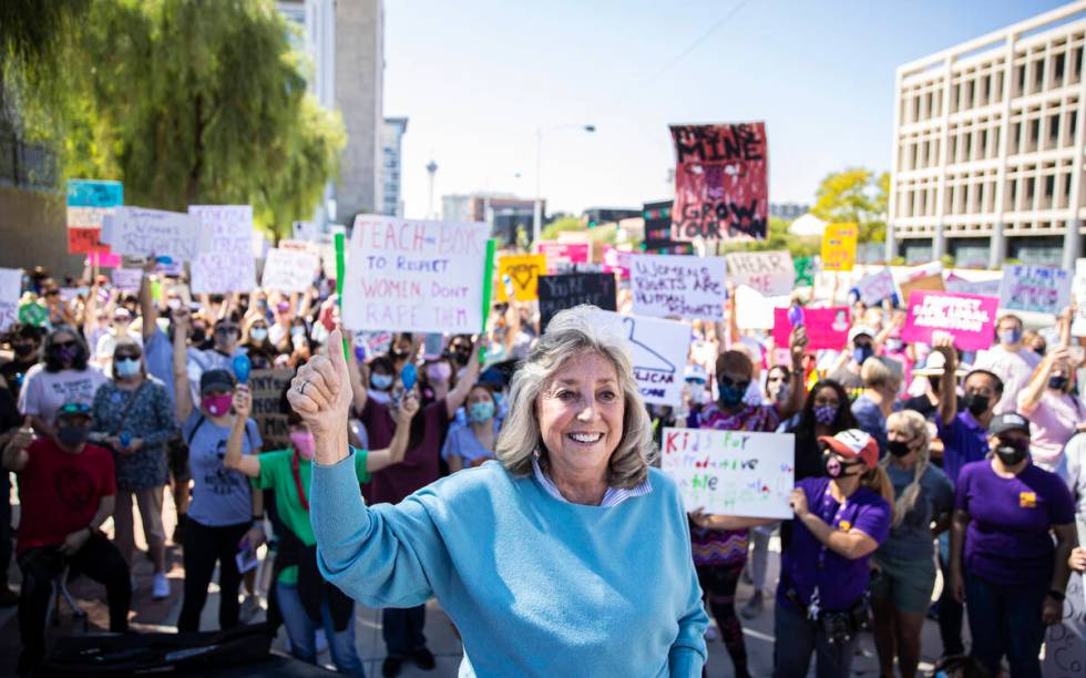 Rep. Dina Titus, D-Nev., speaks to demonstrators outside the Lloyd D George Courthouse during a ...