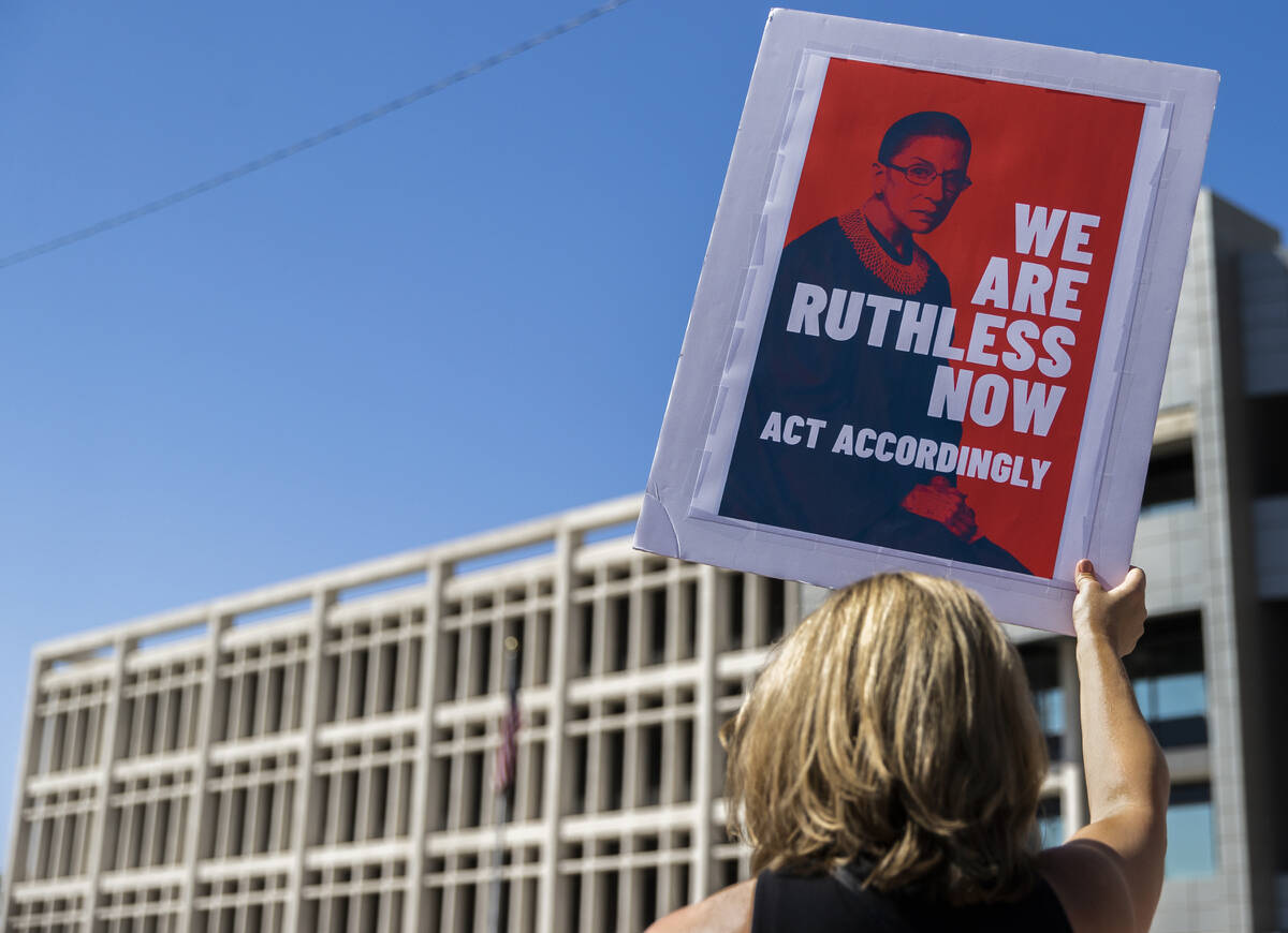 Demonstrators gather outside the Lloyd D George Courthouse during a March for Reproductive Righ ...