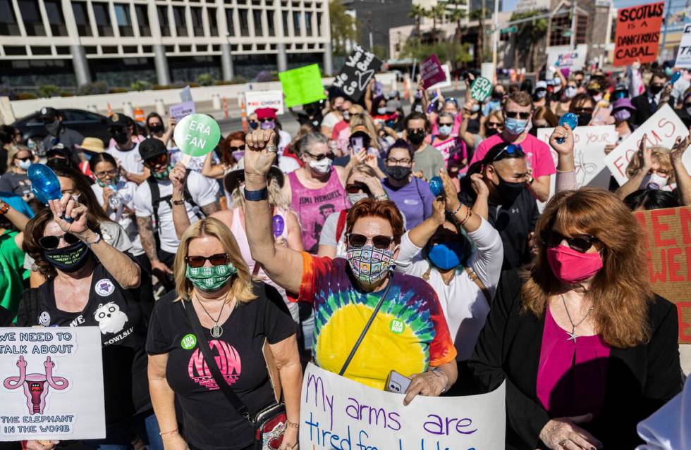 Demonstrators gather outside the Lloyd D George Courthouse during a March for Reproductive Righ ...