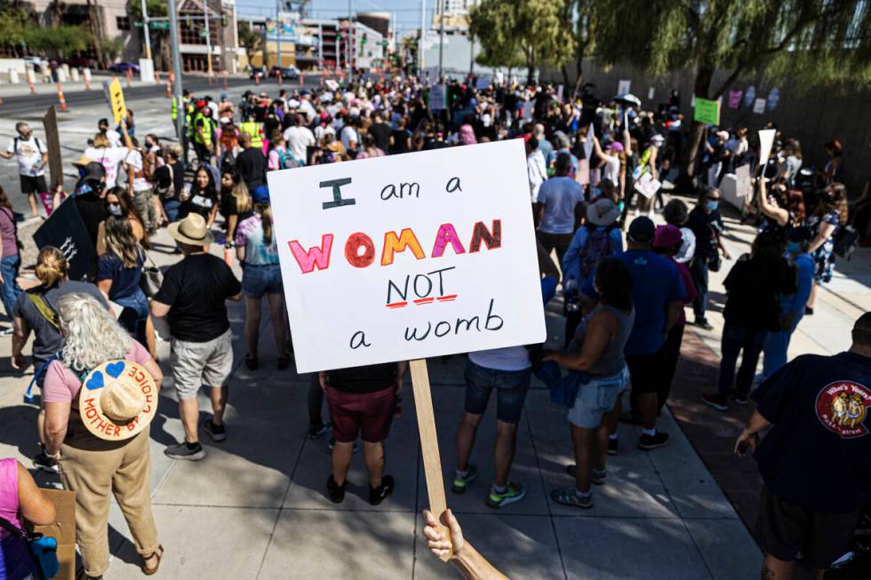 Demonstrators gather outside the Lloyd D George Courthouse during a March for Reproductive Righ ...