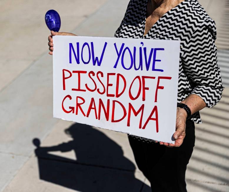 Paulette Pratt demonstrates outside the Lloyd D George Courthouse during a March for Reproducti ...