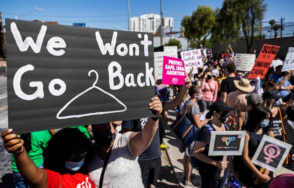 Demonstrators gather outside the Lloyd D George Courthouse during a March for Reproductive Righ ...