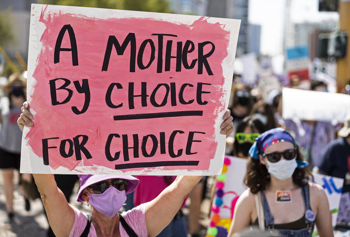 Demonstrators gather outside the Lloyd D George Courthouse during a March for Reproductive Righ ...