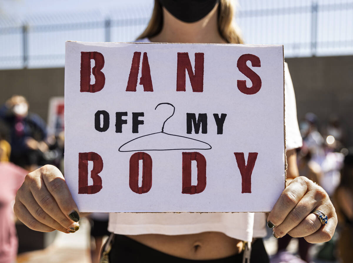 Chelsie Shurtleff demonstrates outside the Lloyd D George Courthouse during a March for Reprodu ...