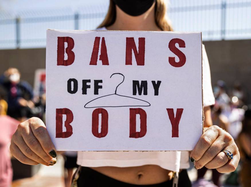 Chelsie Shurtleff demonstrates outside the Lloyd D George Courthouse during a March for Reprodu ...