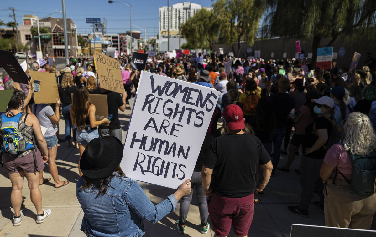 Demonstrators gather outside the Lloyd D George Courthouse during a March for Reproductive Righ ...