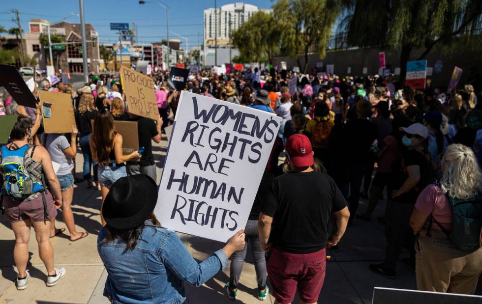 Demonstrators gather outside the Lloyd D George Courthouse during a March for Reproductive Righ ...