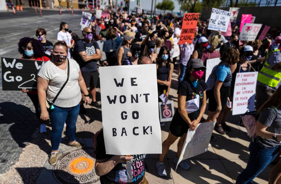 Demonstrators gather outside the Lloyd D George Courthouse during a March for Reproductive Righ ...