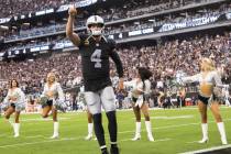 Raiders quarterback Derek Carr (4) salutes the crowd after being announced before the start of ...