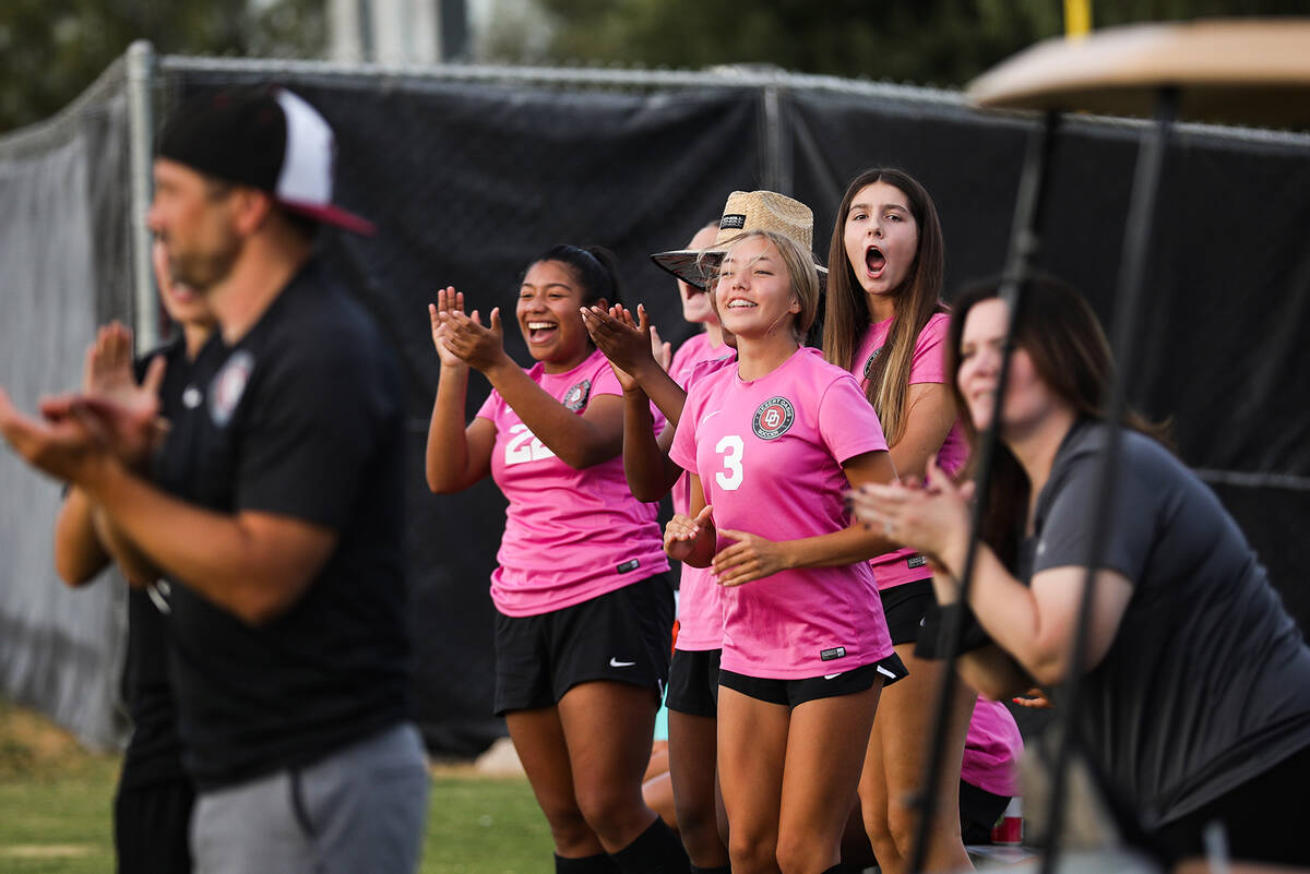 Desert Oasis players cheer after their team made a goal in a game against Shadow Ridge at Deser ...