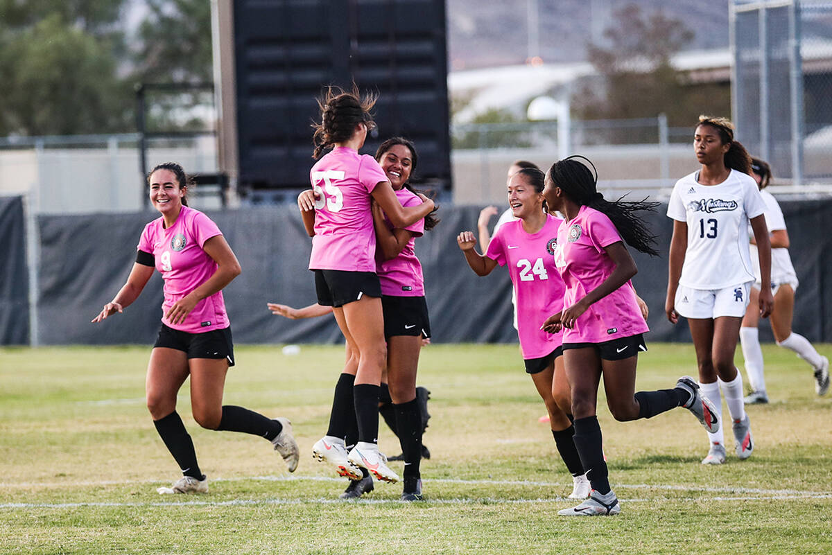 Desert Oasis players cheer after scoring during a game at Desert Oasis High School in Las Vegas ...