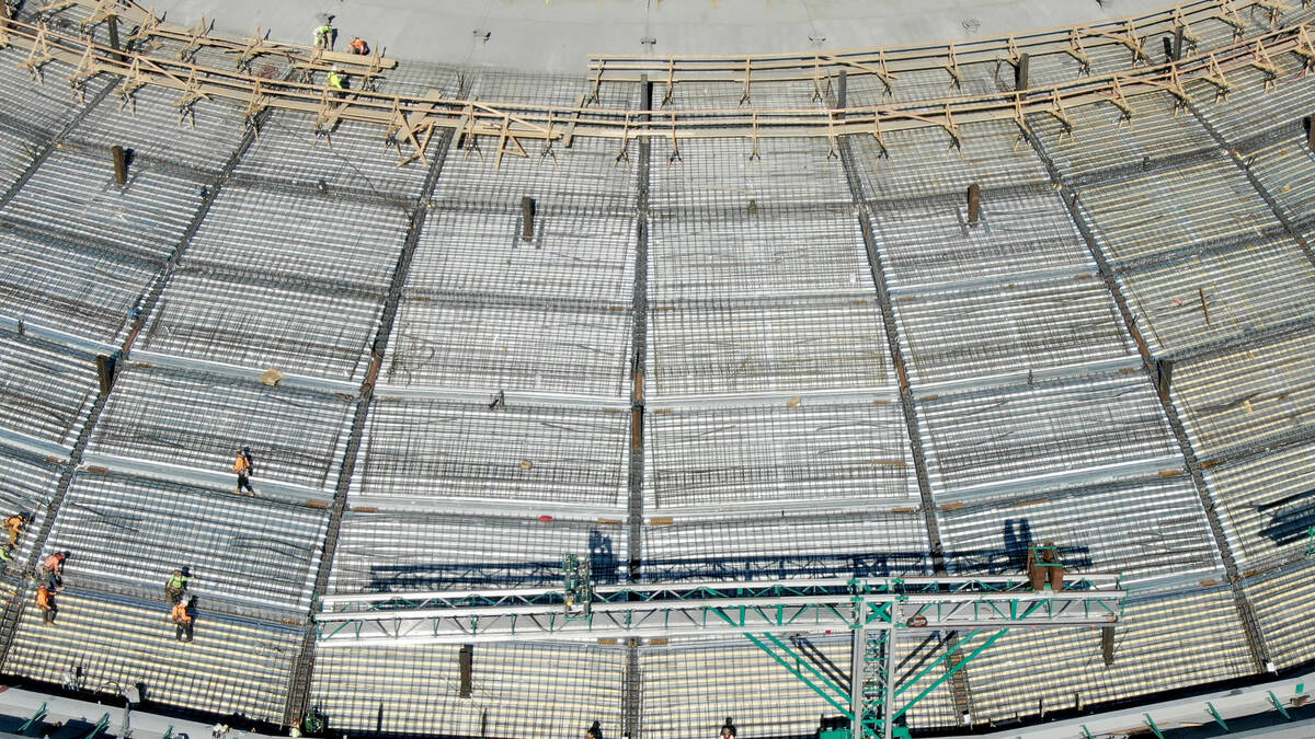 An aerial photo of workers on top of the MSG Sphere at the Venetian as construction continues o ...