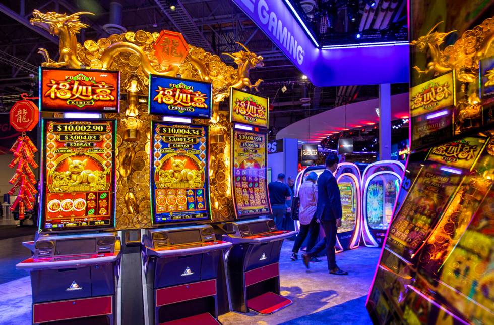 FU RU YI slot machines are ready for play within the Aruze Gaming display area during day 2 of ...