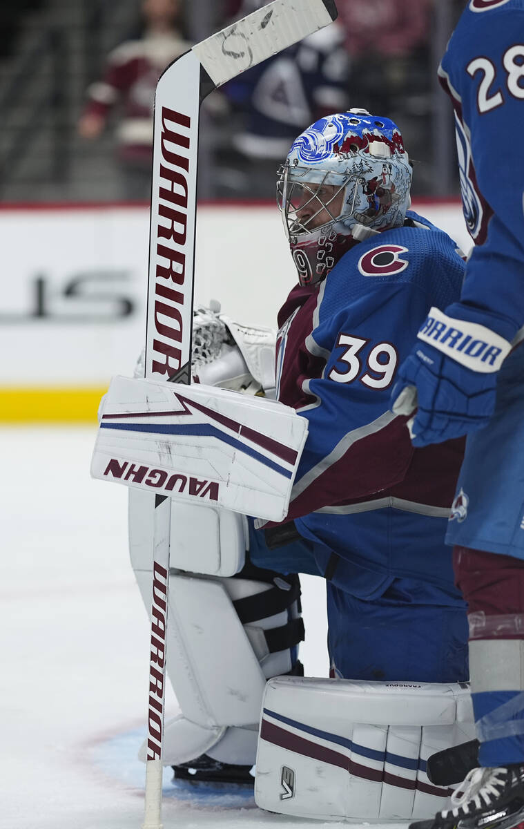 Colorado Avalanche goaltender Pavel Francouz (39) reacts to being injured against the Vegas Gol ...
