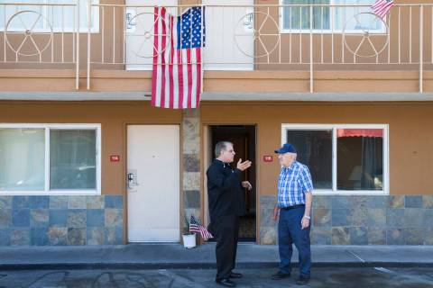 Arnold Stalk, left, founder of the Veterans Center, talks with resident Arthur Price at Veteran ...