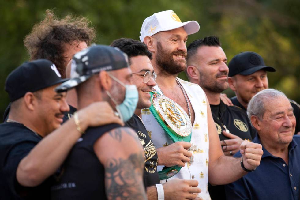 WBC heavyweight champion Tyson Fury poses for photos after a press conference at Toshiba Plaza ...