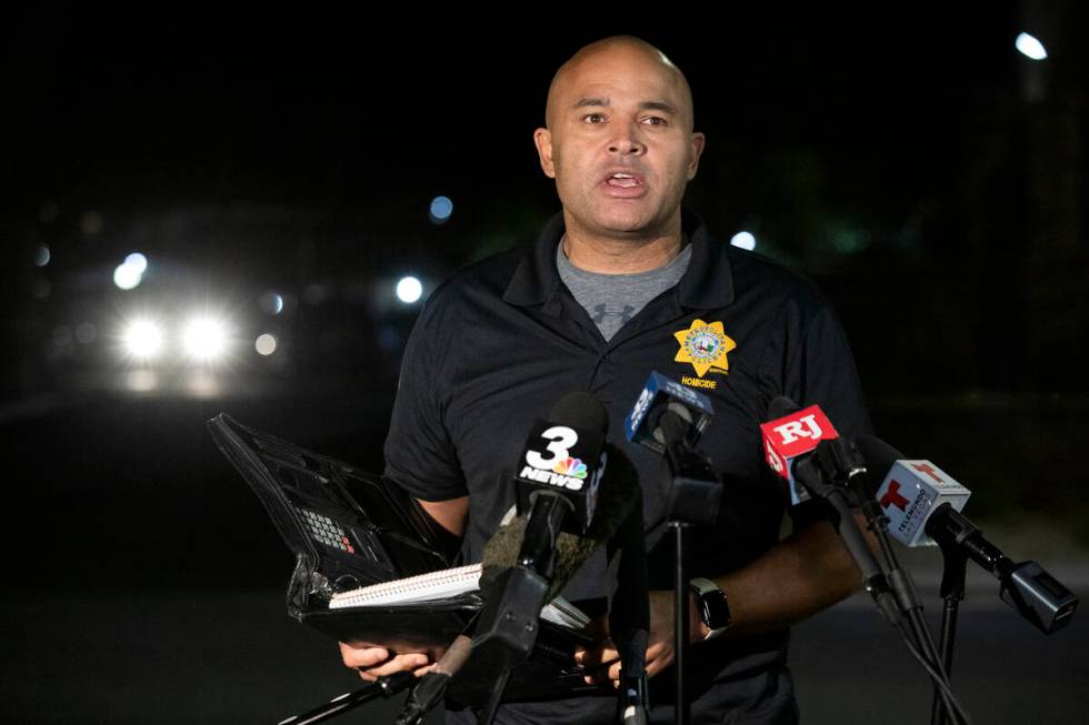 Lt. Ray Spencer gives a media briefing as Las Vegas police investigate a homicide in the 2050 b ...