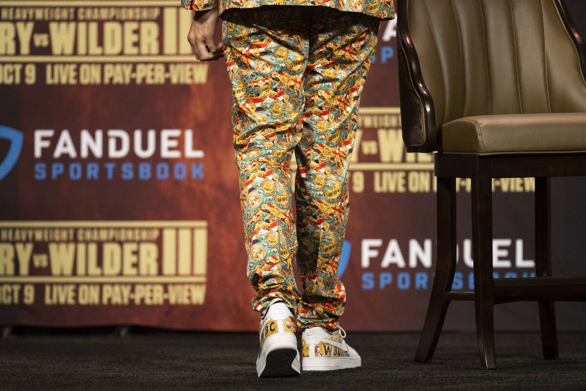 Tyson Fury's outfit during a press conference in advance of his heavyweight title fight against ...