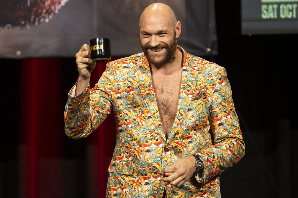 Tyson Fury participates during a press conference in advance of his heavyweight title fight aga ...