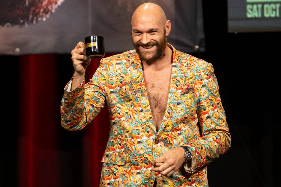 Tyson Fury participates during a press conference in advance of his heavyweight title fight aga ...