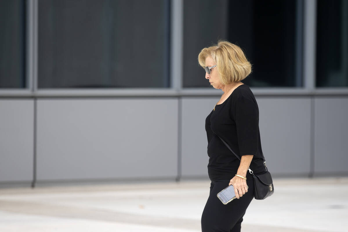 Former 24/7 Private Vaults employee Sylviane Whitmore exits the Lloyd George U.S. Courthouse af ...