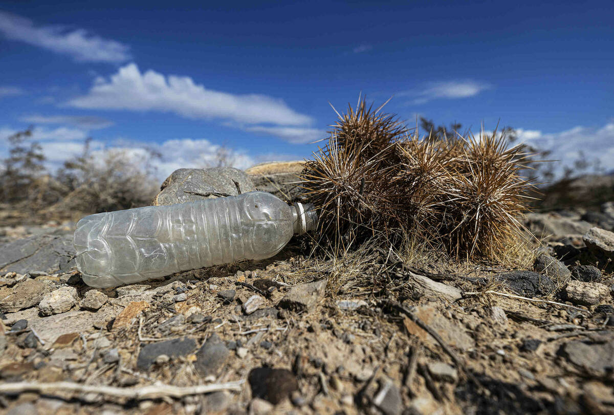 An empty water bottle in a vacant field on Saturday, Oct. 9, 2021, in Las Vegas. (Benjamin Hage ...