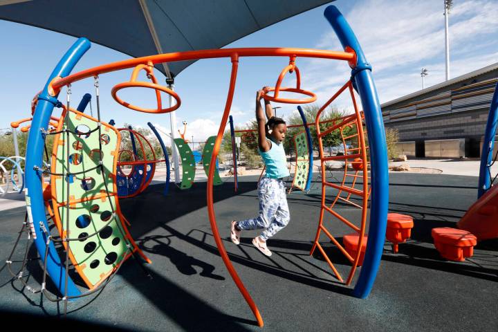 Juju Lowe , 7 of Las Vegas plays at Baker Park, Friday, Oct. 8, 2021, in Las Vegas. (Chitose Su ...